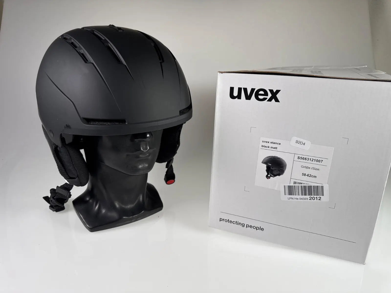 uvex Stance Skihelm Black matt 58-62 cm #9204 R1 